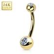 Zlatý piercing do pupíku